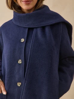 Manteau long avec écharpe amovible