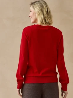 Pull boutons-bijoux aux manches