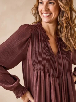 Robe à plis nervurés
