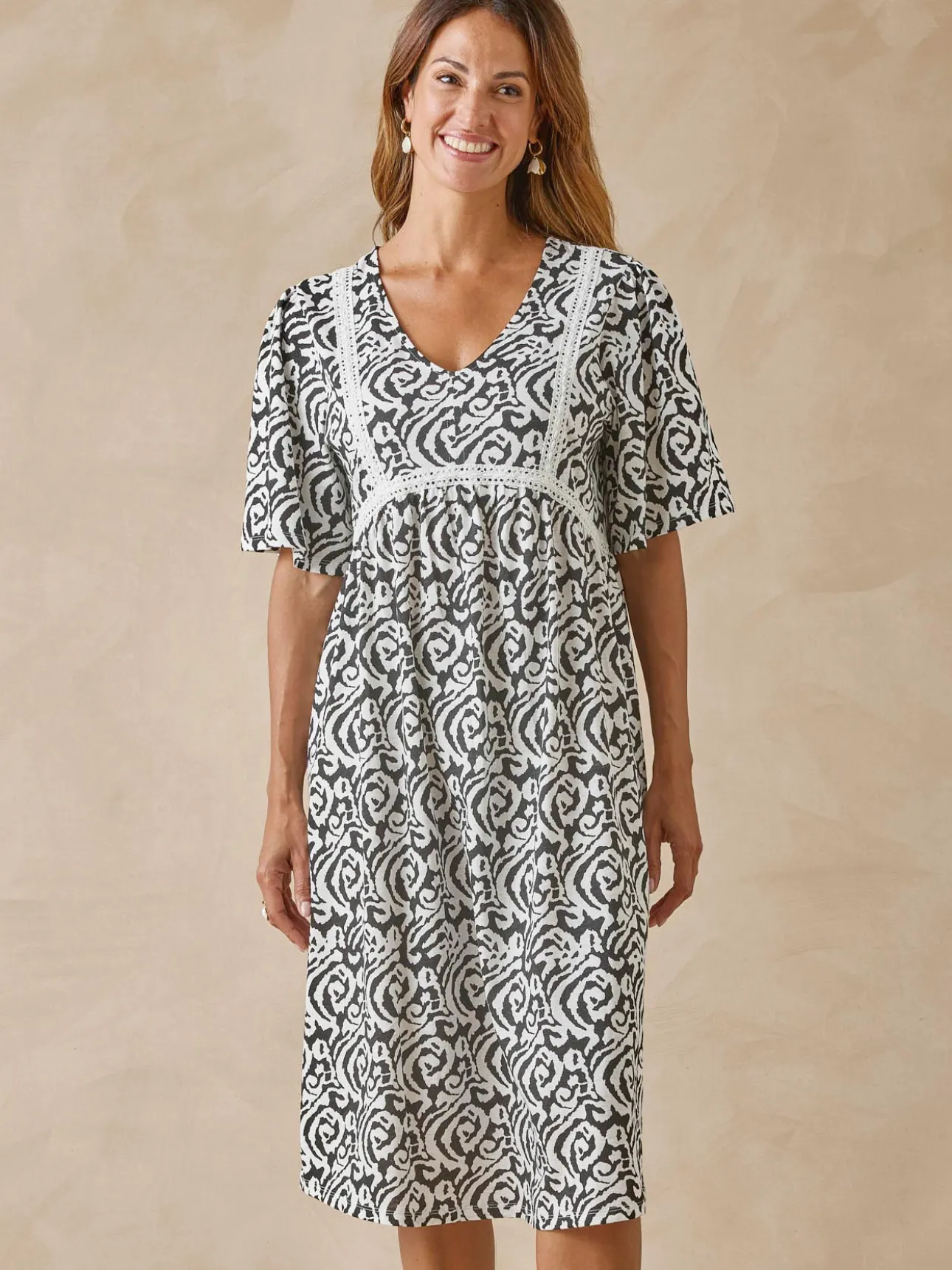 Robe évasée élastiquée taille